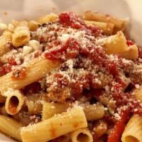 Rigatoni Piccanti Lunch · Rigatoni with Italian sausages, bell peppers, and mushrooms in a spicy tomato sauce.