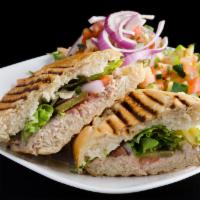 Tuna Sandwich · Tuna salad, lettuce, tomato, pickles and onions.
