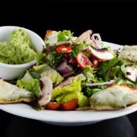 Green Salad · Mixed greens, cherry tomatoes, mushrooms and purple onions, dressed in house vinaigrette. Se...
