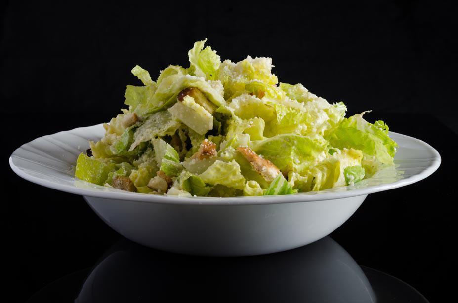 Caesar Salad · Romaine lettuce, croutons and Parmesan cheese dressed in Caesar dressing.