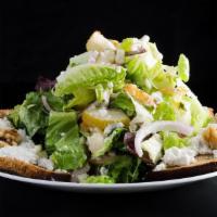 Pear Salad · Mixed greens, sweet walnuts, onions and pear served with four pieces of bread. Topped with f...