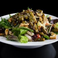 Asparagus Oreganatto · Mixed greens with cherry tomatoes, onion, mushrooms, basil and feta cheese. Topped with stir...