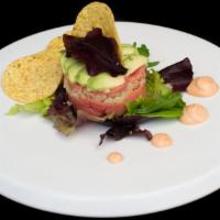 Nachos Tartar · Choice of spicy tuna, spicy salmon with spicy mayo.