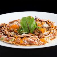 Sushi Pizza · Baked crispy tortilla, topped with chopped spicy tuna, crunchy, spicy mayo and sweet sauce.