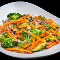 Veggie Heaven · Stir fried carrots, broccoli, zucchini, mushroom and onion.