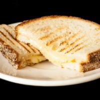 Kid's Grilled Cheese · White bread with melted mozzarella cheese.