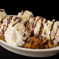 Banana Boom · butter fried banana. served with 2 scoops of ice cream and whipped cream.
