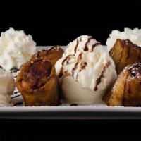 Apple Strudel · 4 pieces of crunchy eggroll filled with apples and raisins. Served with ice cream and whippe...