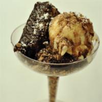 Brownie Sundae · Warm Homemade Brownie topped with Vanilla Icecream, Chocolate Syrup & Whipped Cream