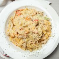 Chicken and Shrimp Rasta Pasta · Spicy and creamy sauce.Topped with parmesian cheese