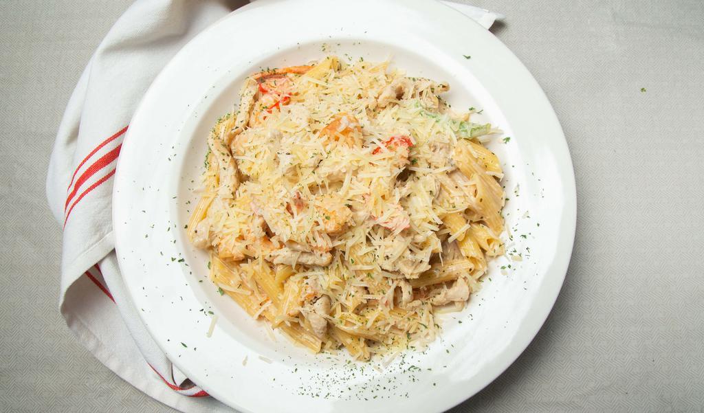 Chicken and Shrimp Rasta Pasta · Spicy and creamy sauce.Topped with parmesian cheese
