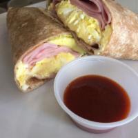 Egg Wraps · 2 scrambled eggs with choice of 3 ingredients, wrapped in choice of tortilla.