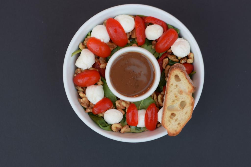 Spinach & Fresh Mozzarella Salad  · Served with cherry tomatoes, walnuts, roasted red peppers & balsamic dressing.