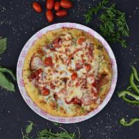 Seaton Farm Pizza · Roasted red pepper, prosciutto, cherry tomato, mozzarella and pesto sauce.