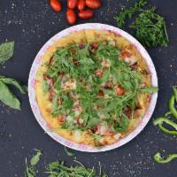 Shaw Pizza · Ham, baby arugula, cherry tomato, mozzarella and pesto sauce.