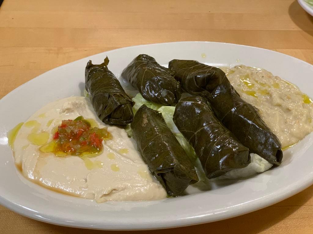 Saltus Plate · A sampler of hummus, UNAVAILABLE baba ghanouj and veggie dolmathes.