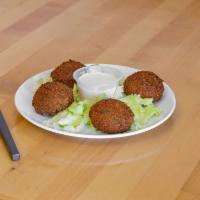 Falafel · Ground chickpeas, onions and spices deep fried.