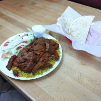 Spicy Gyro Plate  · Thin slices of roasted meat.