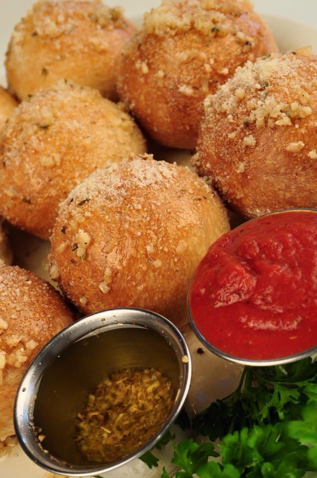Garlic Knots · Freshly baked, garlic infused olive oil, and parmesan. Served with marinara. Add mozzarella cheese for an additional charge.
