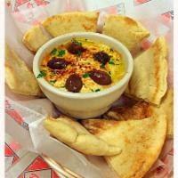 Hummus · Chickpea dip, evoo, and Kalamata olive. Served with pita. Add protein for an additional char...