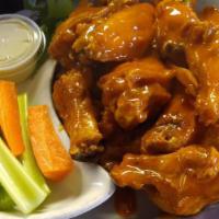 Wings · Your choice of fried Jumbo wings, served with celery, and bleu cheese or ranch dressing. Ext...