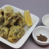 Maitake Tempura · 5 Pieces of Maitake mushroom Tempura with Truffle Salt and Parmesan Cheese.