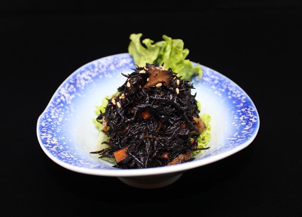 Hijiki · Black seaweed cooked with dashi soy sauce and topped with sesame. 