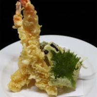 Tempura Appetizer · Lightly fried shrimp and vegetables served with tempura sauce. 