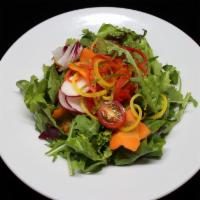 Organic Mixed Greens Salad · Fresh green salad with homemade onion dressing. 