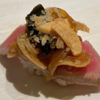 Tuna Carpaccio · Thinly sliced tuna.