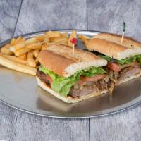 New York Strip Sandwich · Served with fries.