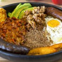 Bandeja Paisa  · Chorixo, arepa Colombian beans, sweet plantains, avocado, chicharron, fried eggs, rice, stea...