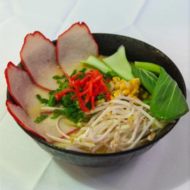 15. Curry Ramen · Curry soup base, normal wavy noodle, Chashu or BBQ pork, bean sprouts, bok choy, green onion, corn, ginger.