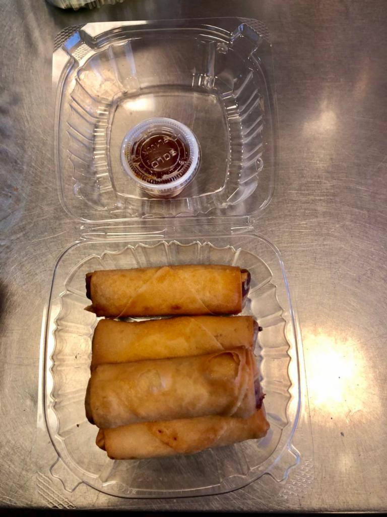 Crispy Spring Rolls · Stuffed with cabbage, bean thread, taro, carrot and served with plum sauce. Veggie. 