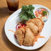 Curry Puffs · Cooked potato and corn, onion curry powder in puff pastry and with side of cucumber salad. V...