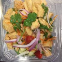 Tofu Salad · Fried tofu, tomato, cucumber, red onion, mint, scallion and cilantro tossed with chili lime ...