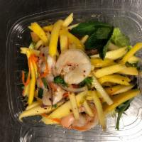 Mango Salad · Shredded mango, shrimp(2), tomato, mint, scallion, cilantro and onion tossed in spicy lime j...