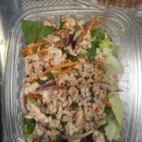 Chicken Salad · Larb Gai. Chopped chicken on lettuce tossed with lime juice, chili flakes, mint, shallot, sc...
