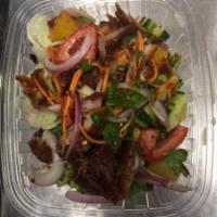 Crispy Duck Salad · Roasted duck with pineapple, red onion, tomato, scallion, cilantro, chili pepper and mint le...