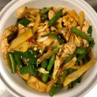 Pad Kra Prow · Basil. Sauteed with chili, onion, bamboo and string bean basil in garlic sauce. Served with ...