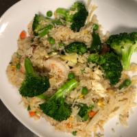 Thai Fried Rice · Cooked Thai style with egg, broccoli, onion scallion pea and carrot. 