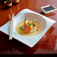Golden Salmon · Spicy crabmeat salad radish sprouts wrapped with salmon served ruda sauce