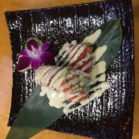 WoodStock Roll · Spicy tuna , crunchy, cucumber inside, salmon,tuna,avocado served with wasabi mayo sauce