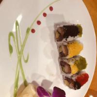 Seasons Roll · Tuna, yellowtail, salmon & avocado inside with rainbow tobiko on top