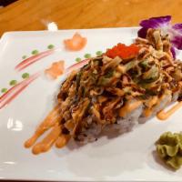 Lobster Roll · Tempura lobster & Asparagus inside, crabmeat, seaweed salad , served with eel sauce & spicy ...