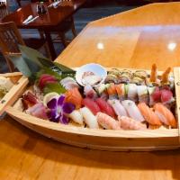 Love Boat For 2 · 18 pcs chef’s choice sashimi , 10 pcs chef’s choice nigiri with rainbow roll & highway 92 roll