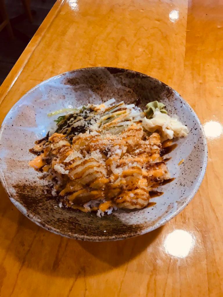 Tempura Poke Bowl · Tempura shrimp, tempura white fish, tempura chicken, seaweed salad & cucumber , crunchy, served with eel sauce & spicy mayo, choice white rice, sushi rice or green salad