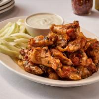 Spicy Scarpariello Wings · Marinated w/ Garlic & Rosemary, Pan-Fried & Tossed in a Spicy Lemon & Butter Herb Sauce Serv...