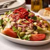 Carmine's Salad · Mixed Greens, Tomato, Onions, Pepperoncini, Celery, Radish, Olives Topped w/ Diced Meats & C...