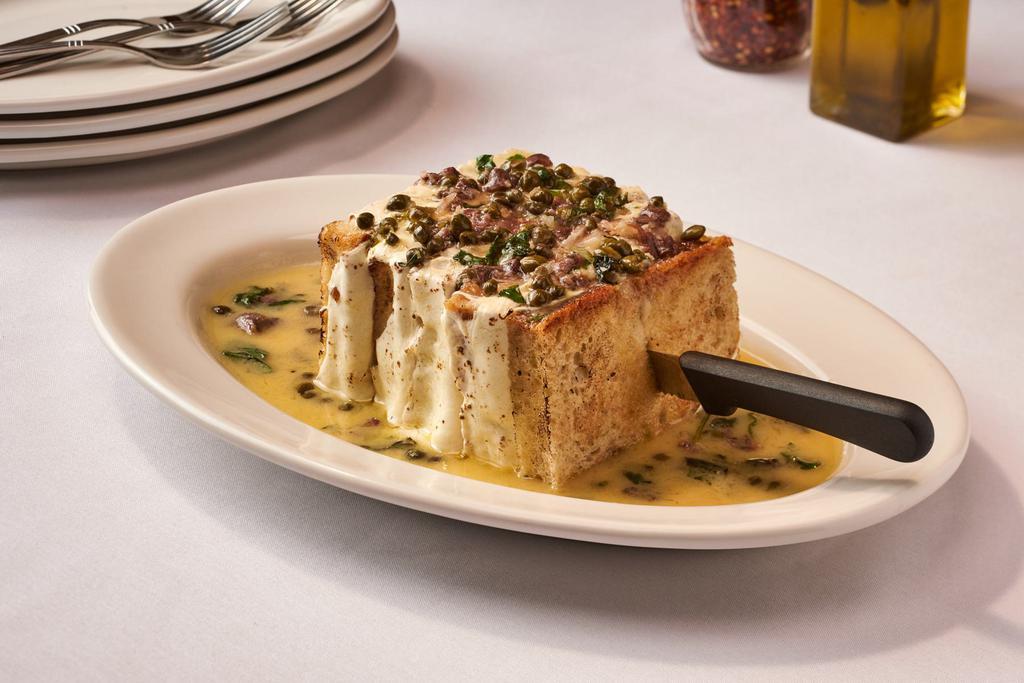 Spiedini Alla Romana · Thick Sliced Bread Rubbed w/ Garlic, Layered w/ Fresh Mozzarella Cheese & Stacked - Toasted & Melted Topped w/ Lemon, Butter, White Wine, Capers & Anchovies Sauce